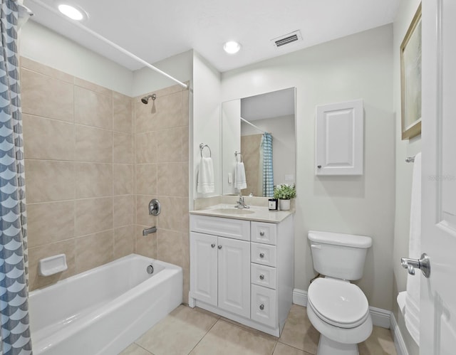 1771 Ringling Blvd Unit 1104, Sarasota, FL 34236 - bathroom with visible vents, shower / bath combination with curtain, tile patterned flooring, vanity, and toilet