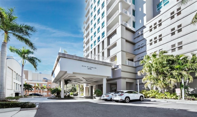 1771 Ringling Blvd Unit 1104, Sarasota, FL 34236 - view of building exterior featuring uncovered parking