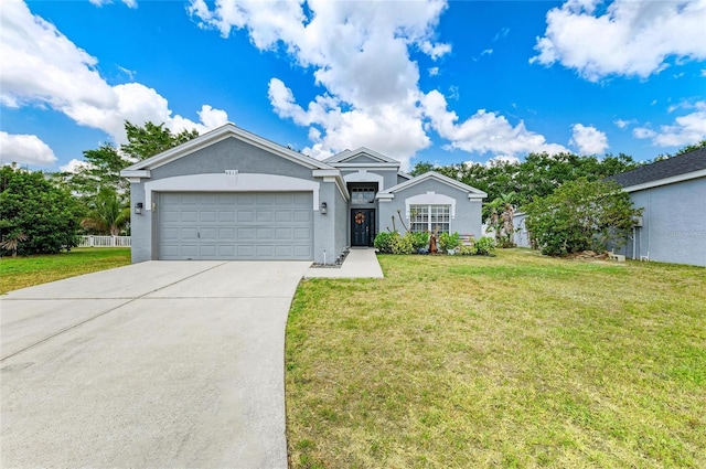 ranch-style home with driveway, an attached garage, a front lawn, and stucco siding