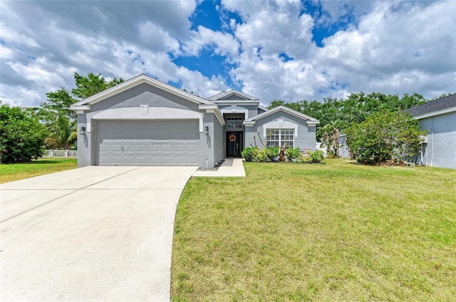 single story home with a garage, concrete driveway, a front lawn, and stucco siding