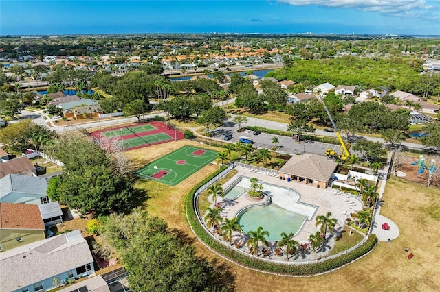 aerial view of residential area with a pool