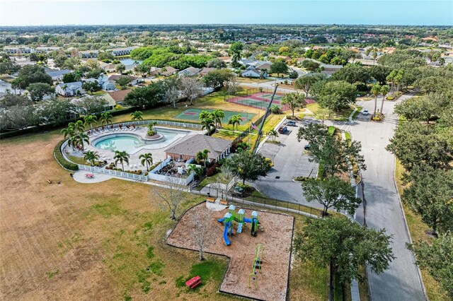aerial view of property's location featuring a pool
