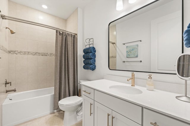 full bathroom featuring toilet, shower / bath combination with curtain, vanity, and tile patterned floors
