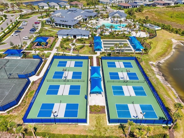 aerial view of residential area with a pool area