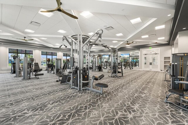 workout area with carpet flooring and ceiling fan