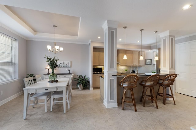 8045 Tybee Ct Unit 8045, University Park, FL 34201 - dining area with an inviting chandelier, recessed lighting, baseboards, and a raised ceiling