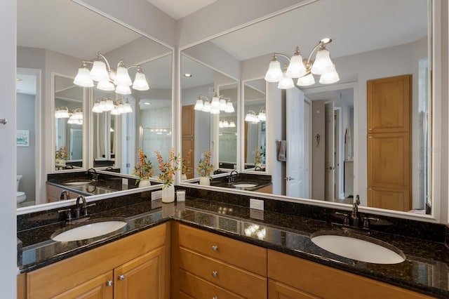 8045 Tybee Ct Unit 8045, University Park, FL 34201 - bathroom with double vanity, a sink, and toilet