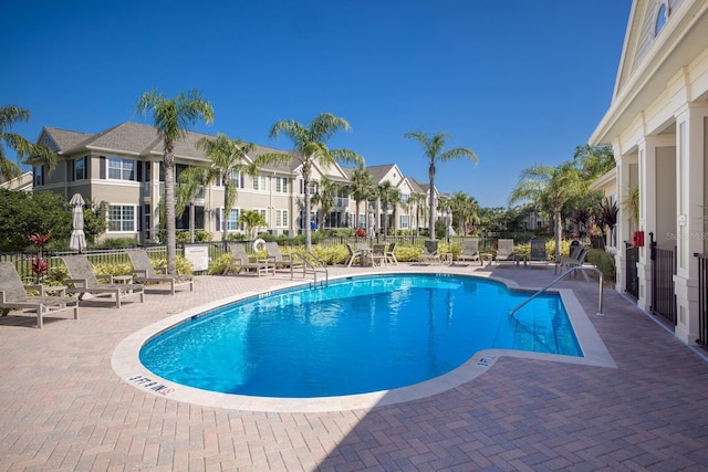 8045 Tybee Ct Unit 8045, University Park, FL 34201 - pool with a residential view, fence, and a patio area