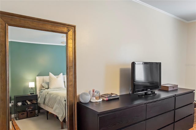 bedroom with ornamental molding
