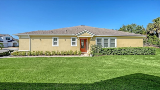 11847 Meadowgate Pl, Lakewood Ranch, FL 34211 - ranch-style home with a front yard and stucco siding
