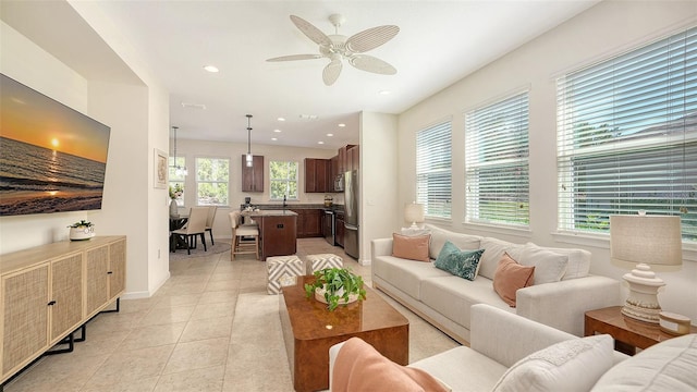 11847 Meadowgate Pl, Lakewood Ranch, FL 34211 - living room featuring baseboards, recessed lighting, light tile patterned floors, and a ceiling fan