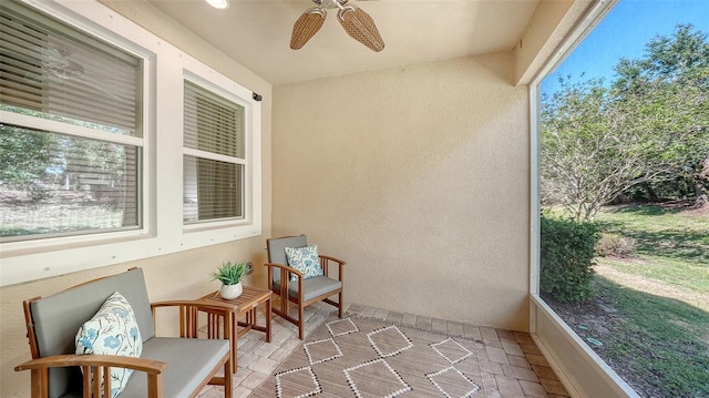 11847 Meadowgate Pl, Lakewood Ranch, FL 34211 - sunroom featuring a ceiling fan and plenty of natural light