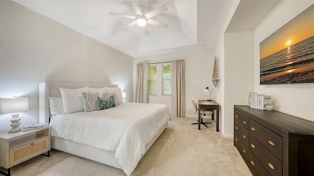 11847 Meadowgate Pl, Lakewood Ranch, FL 34211 - bedroom featuring baseboards, a ceiling fan, light carpet, and a tray ceiling