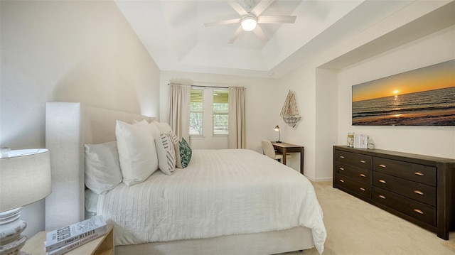 11847 Meadowgate Pl, Lakewood Ranch, FL 34211 - bedroom with light colored carpet, a ceiling fan, and a tray ceiling