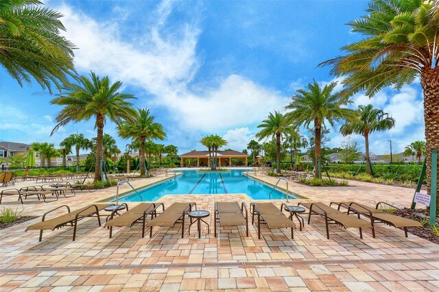 11847 Meadowgate Pl, Lakewood Ranch, FL 34211 - community pool featuring a patio