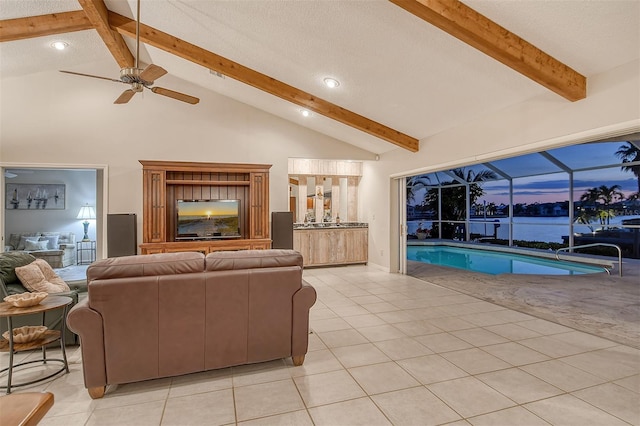 621 Ivanhoe Ln, Holmes Beach, FL 34217 - living room featuring ceiling fan, a sunroom, beamed ceiling, and recessed lighting