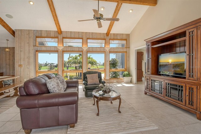 621 Ivanhoe Ln, Holmes Beach, FL 34217 - living room featuring ceiling fan, beam ceiling, and light tile patterned floors
