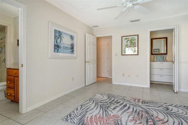 621 Ivanhoe Ln, Holmes Beach, FL 34217 - bedroom with visible vents, baseboards, and light tile patterned floors