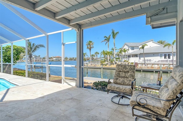621 Ivanhoe Ln, Holmes Beach, FL 34217 - view of patio / terrace featuring a lanai, an outdoor pool, and a water view