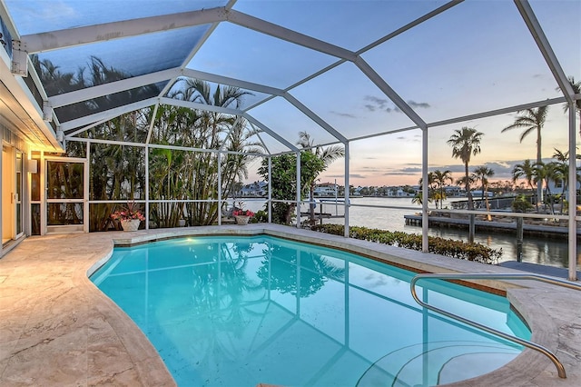 621 Ivanhoe Ln, Holmes Beach, FL 34217 - outdoor pool featuring a patio area, a lanai, and a water view