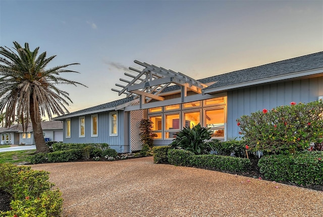 621 Ivanhoe Ln, Holmes Beach, FL 34217 - prairie-style home with a shingled roof