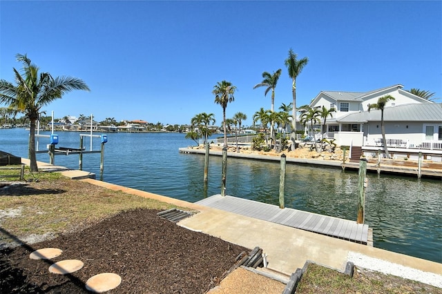 621 Ivanhoe Ln, Holmes Beach, FL 34217 - view of dock featuring a water view