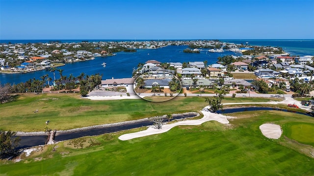 621 Ivanhoe Ln, Holmes Beach, FL 34217 - bird's eye view featuring golf course view, a residential view, and a water view