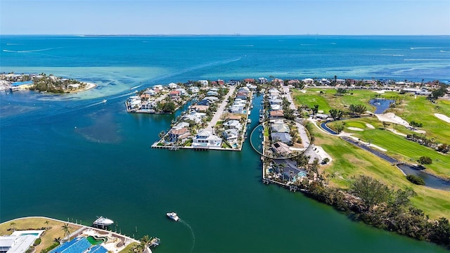 621 Ivanhoe Ln, Holmes Beach, FL 34217 - drone / aerial view with view of golf course, a water view, and a residential view