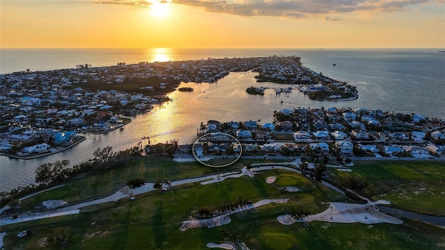 621 Ivanhoe Ln, Holmes Beach, FL 34217 - aerial view at dusk with a residential view and a water view