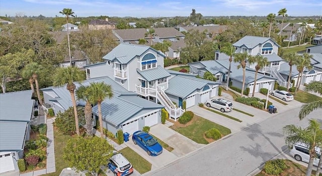birds eye view of property with a residential view