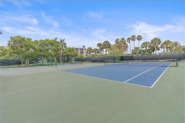 view of sport court with fence and community basketball court