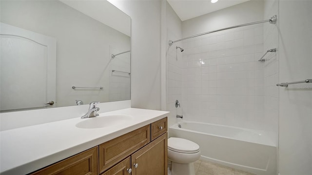 bathroom with toilet, vanity, shower / bath combination, and tile patterned floors