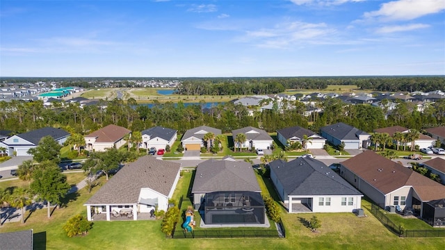 aerial view with a residential view and a water view