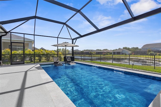 view of swimming pool featuring a water view, fence, a patio, a fenced in pool, and a lanai