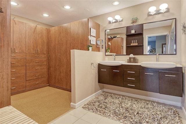4800 Gulf Of Mexico Dr Unit 205, Longboat Key, FL 34228 - bathroom with double vanity, recessed lighting, and tile patterned flooring