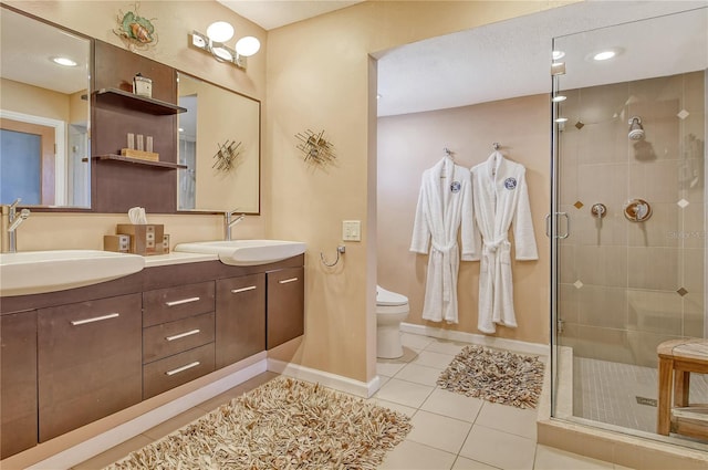 4800 Gulf Of Mexico Dr Unit 205, Longboat Key, FL 34228 - full bathroom with double vanity, tile patterned floors, and a shower stall