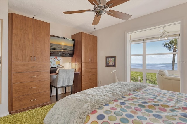 4800 Gulf Of Mexico Dr Unit 205, Longboat Key, FL 34228 - bedroom featuring ceiling fan
