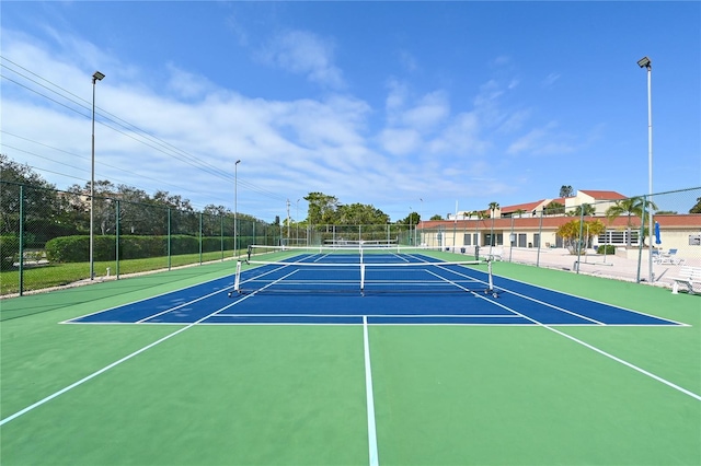 4800 Gulf Of Mexico Dr Unit 205, Longboat Key, FL 34228 - view of tennis court featuring community basketball court