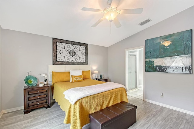bedroom featuring lofted ceiling, baseboards, light wood-style flooring, and visible vents