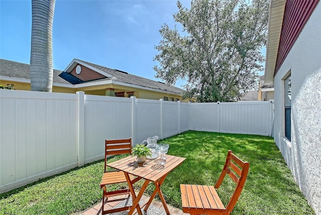 view of yard featuring a fenced backyard
