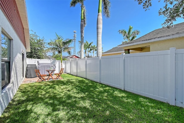 view of yard featuring a fenced backyard