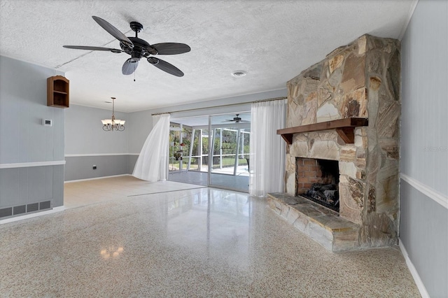 4311 52nd St E, Bradenton, FL 34208 - unfurnished living room with baseboards, a textured ceiling, speckled floor, and ceiling fan with notable chandelier