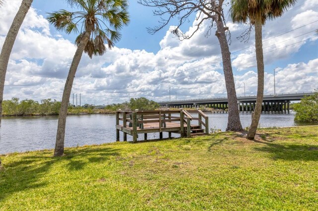 4311 52nd St E, Bradenton, FL 34208 - dock area featuring a yard and a water view