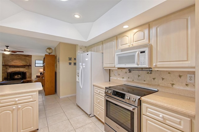4609 Talbot Pl, Sarasota, FL 34241 - kitchen with open floor plan, white appliances, ceiling fan, light countertops, and light tile patterned floors