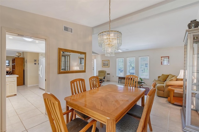4609 Talbot Pl, Sarasota, FL 34241 - dining room with a notable chandelier, visible vents, and light tile patterned floors
