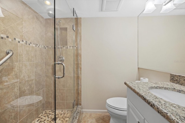 5780 Midnight Pass Rd Unit 410, Sarasota, FL 34242 - bathroom with vanity, toilet, baseboards, a shower stall, and visible vents