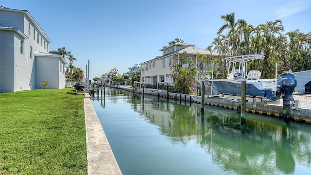 property view of water featuring a boat dock and boat lift