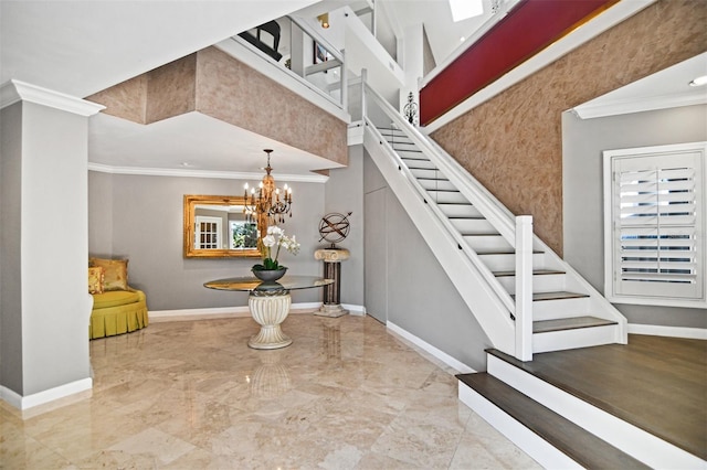 stairway with baseboards, ornamental molding, marble finish floor, and a healthy amount of sunlight