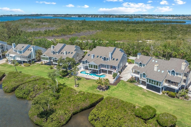 aerial view featuring a residential view and a water view