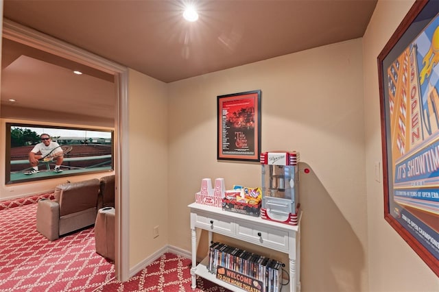 interior space with carpet flooring, recessed lighting, and baseboards